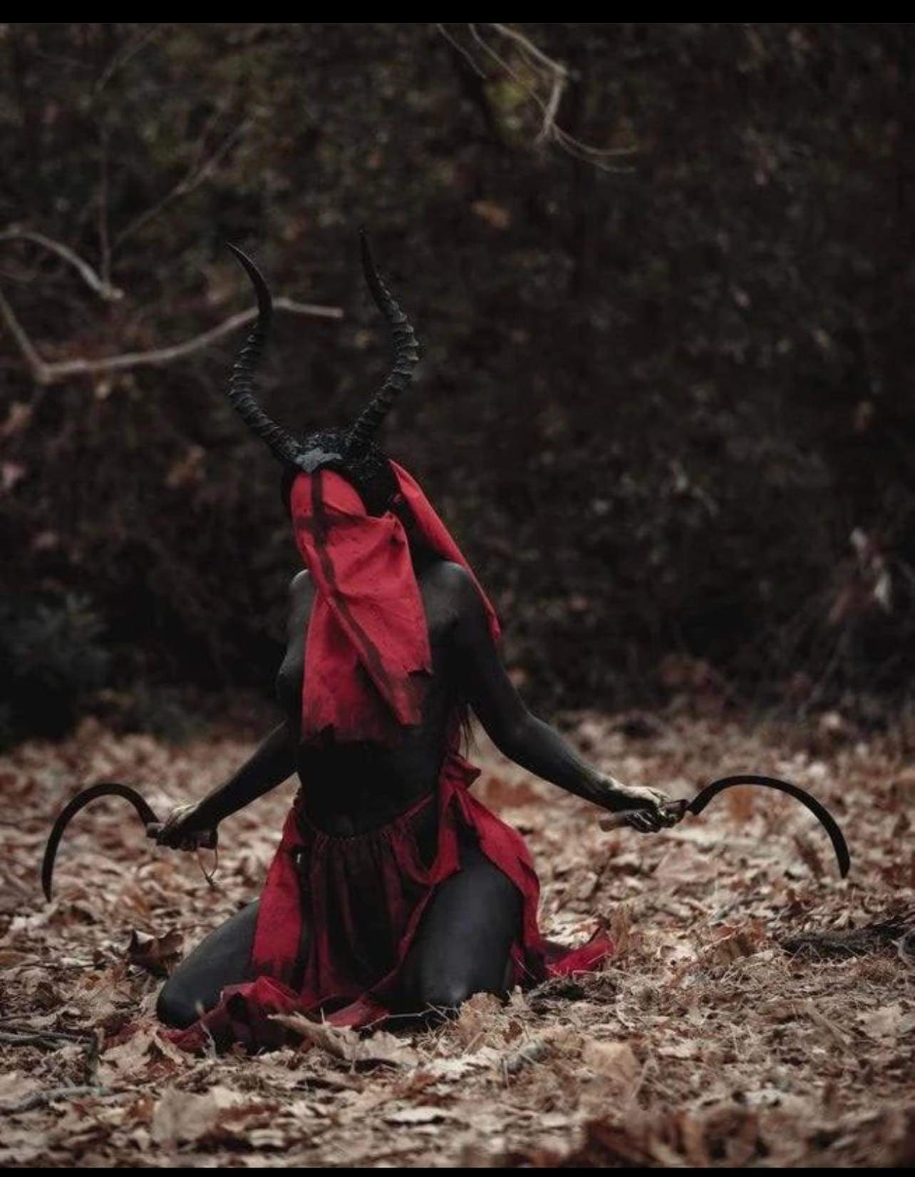 Dark Priestess in Black and Red with Scythes